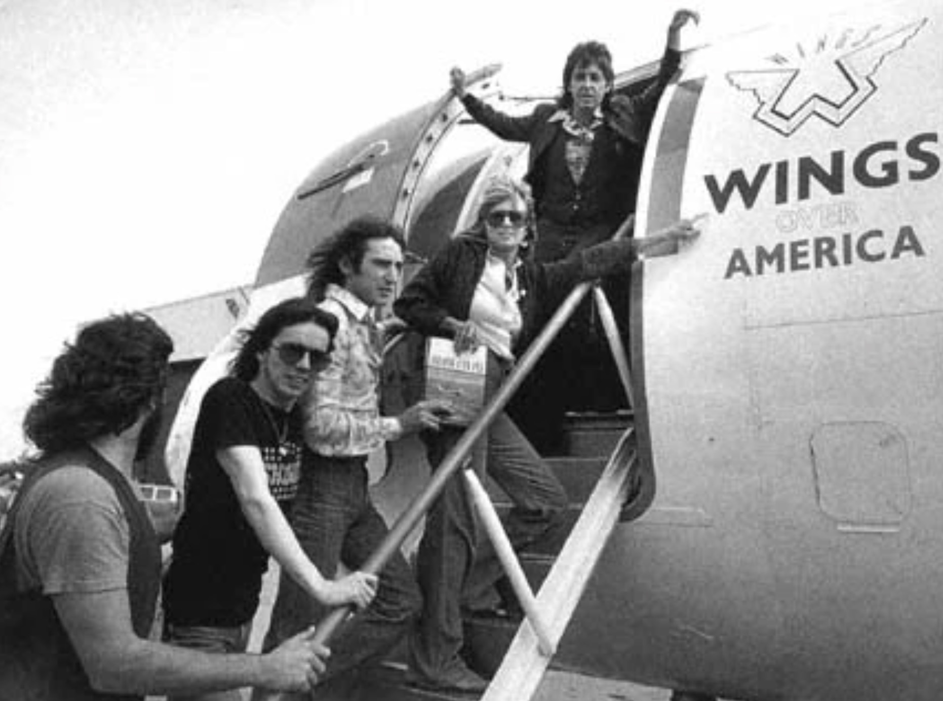 The band boarding the plane in Cleveland 